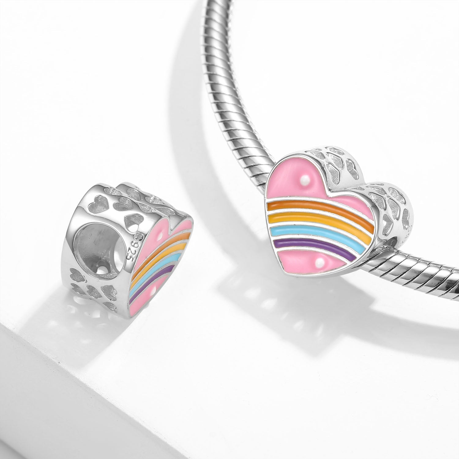Pink heart with rainbow