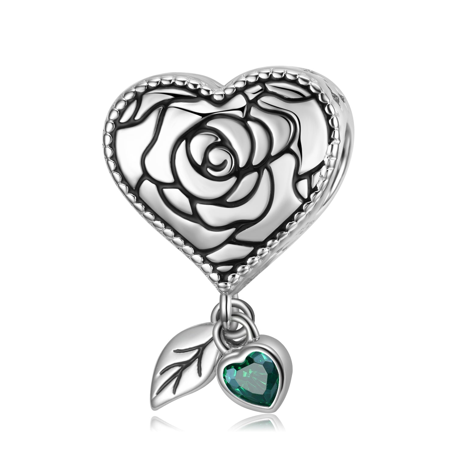 Rose heart with green gemstone