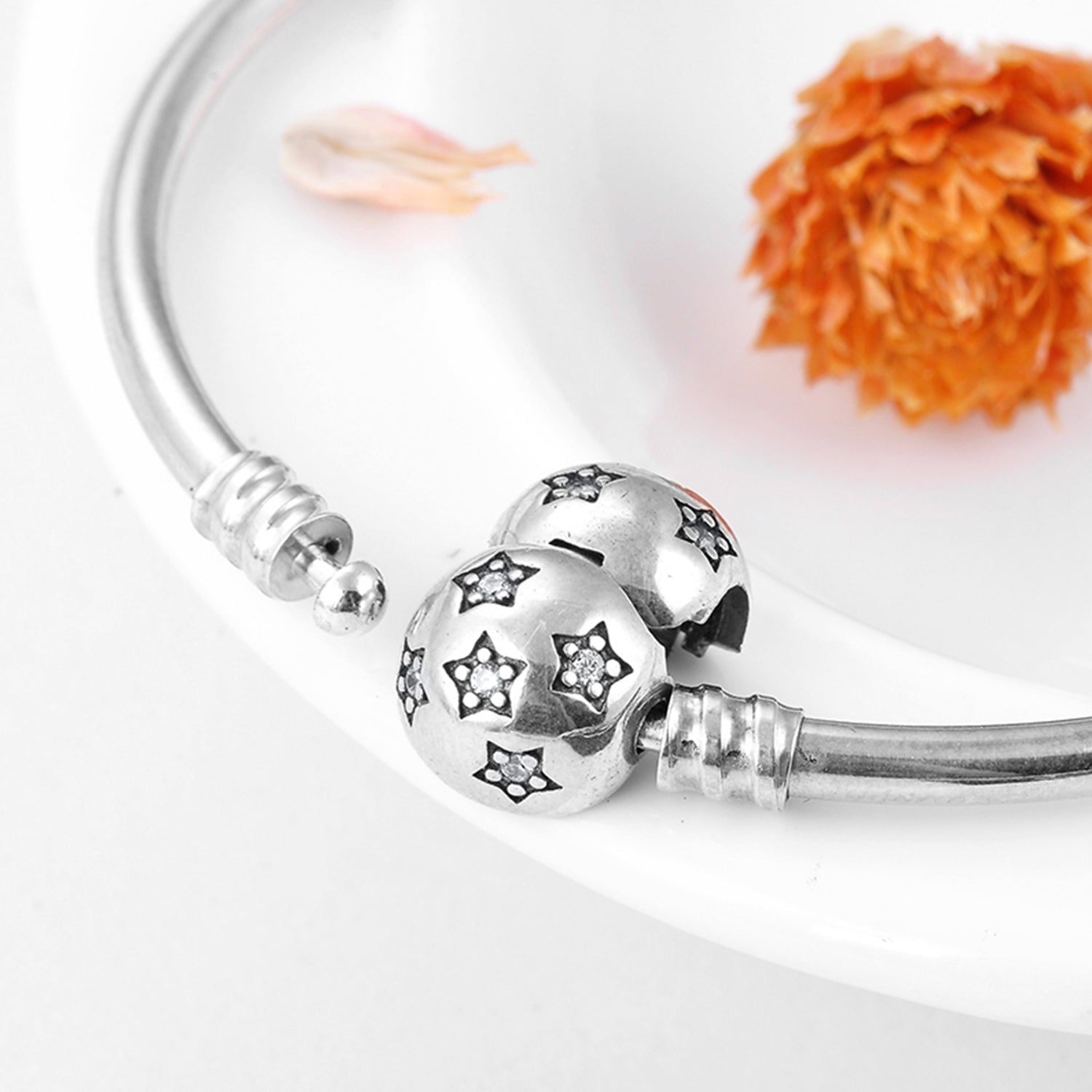 Bangle with star ball clip